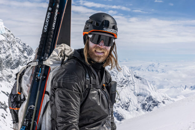 Cody Townsend geared up for backcountry skiing with sunglasses and helmet