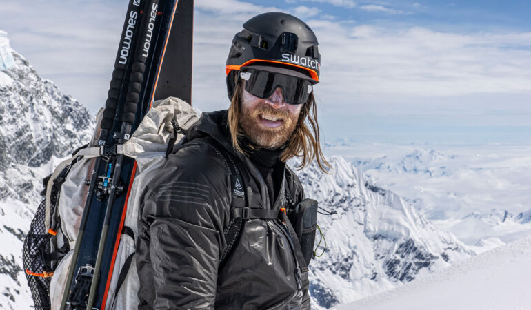 Cody Townsend geared up for backcountry skiing with sunglasses and helmet